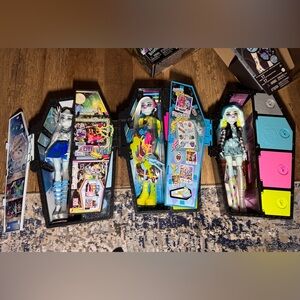 Monster High Doll Trio with Blue, Yellow, and Pink Accents